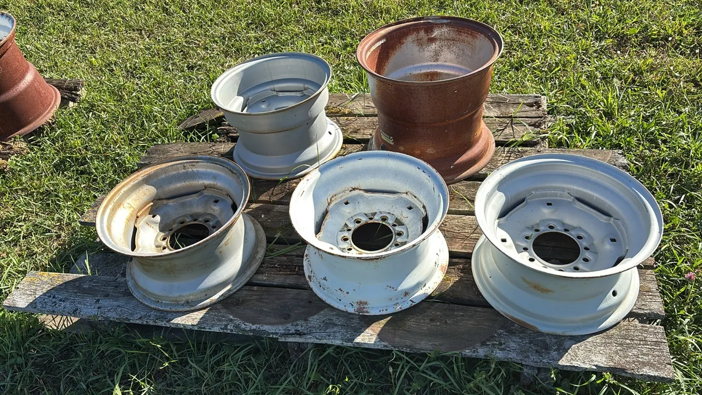 Bundle with (3) 15 x 8 Implement Rims, 6 Bolt Implement Rims, (1) 16.1 Rim, 6 bolt - off of 1330 Air Seeder and (1) 15 x 10 6 bolt Implement Rim