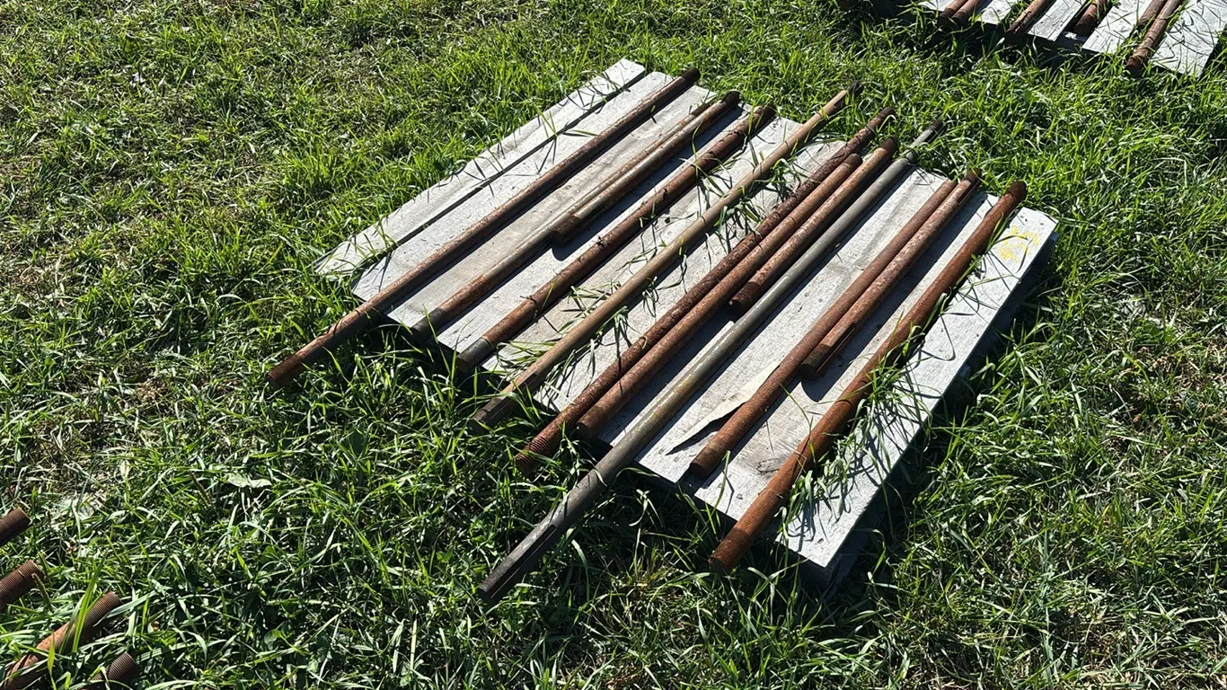 Approximately (12) Various Length Packer Shafts