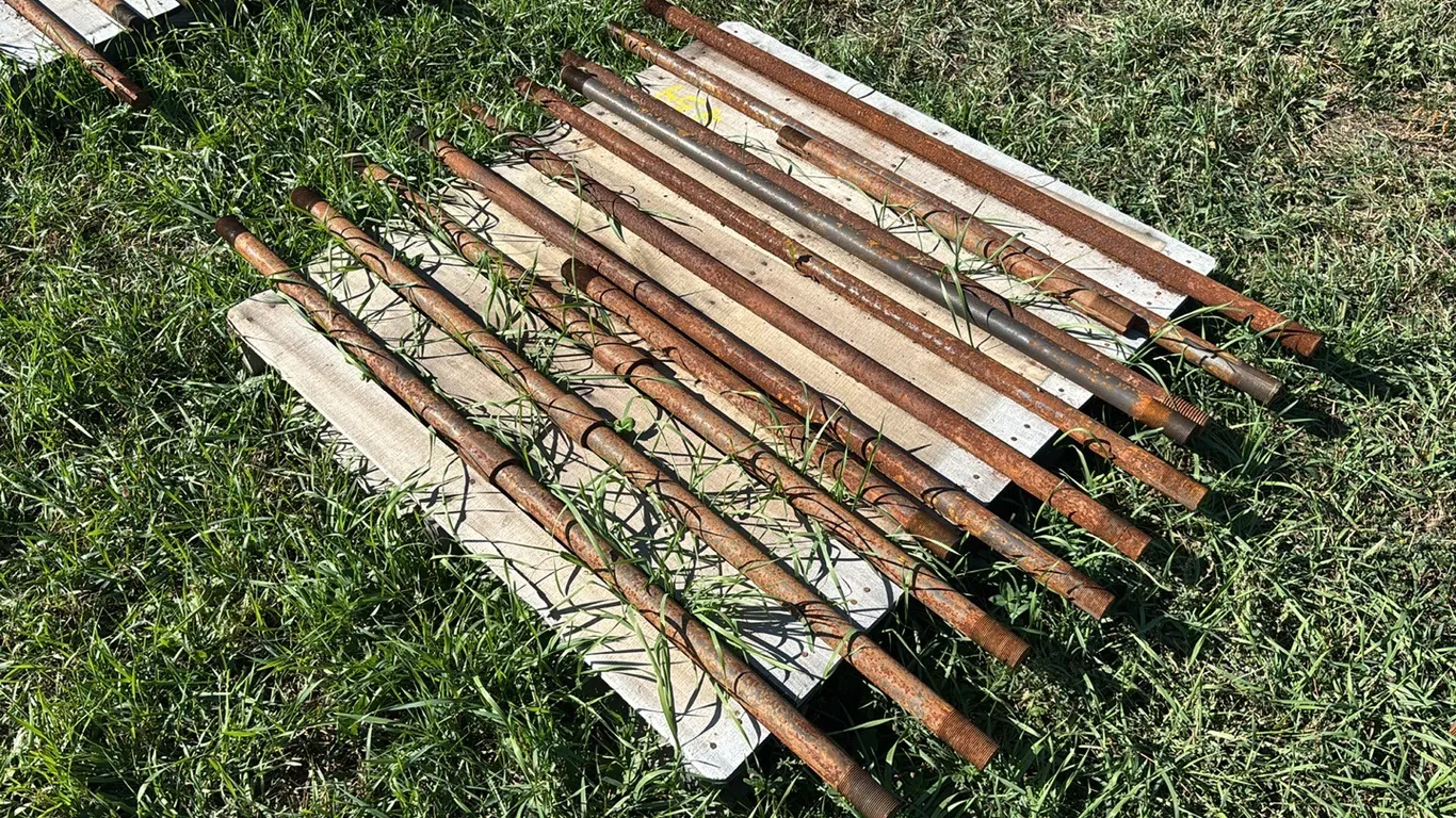 Approximately (12) Various Length Packer Shafts