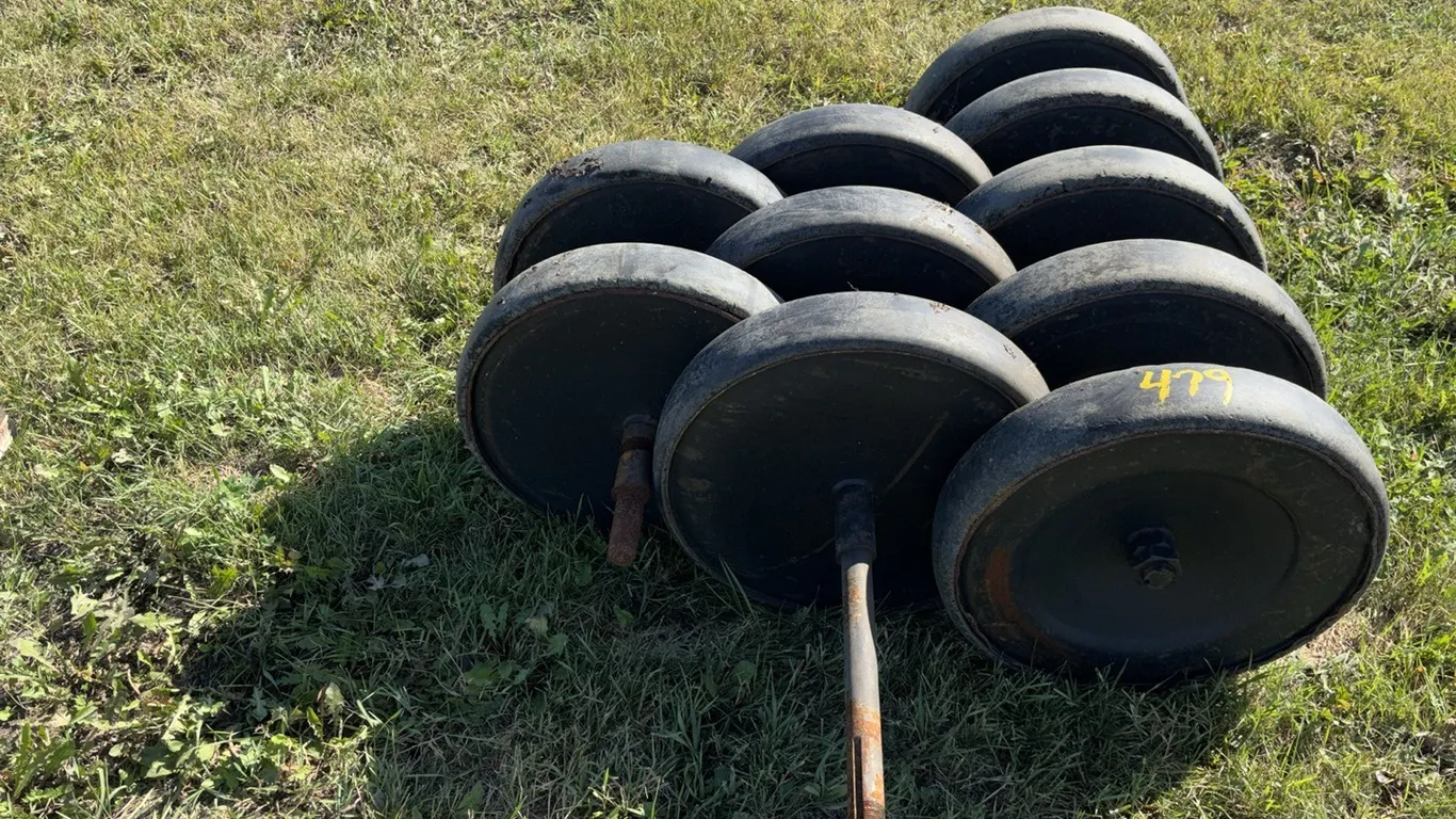 (1) 5 Wheel 4" Rubber Packer Wheel and (5) Used Packer Wheels for Parts