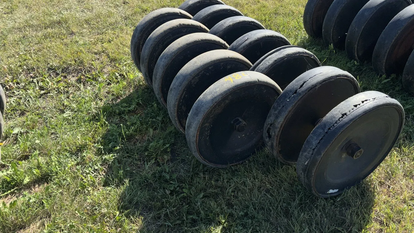 (1) 7 Wheel and (1) 5 Wheel 4" Rubber Packer Wheels