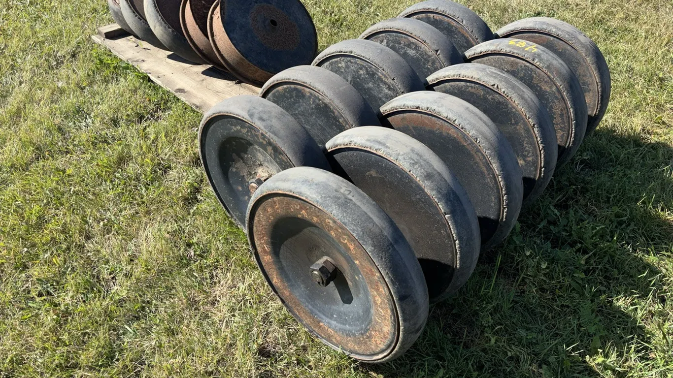 (1) 6 Wheel and (1) 5 Wheel 4" Rubber Packer Wheels