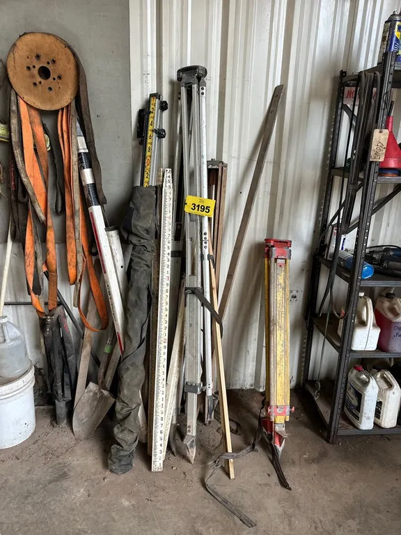Lot Of Story Poles And Transit Stands