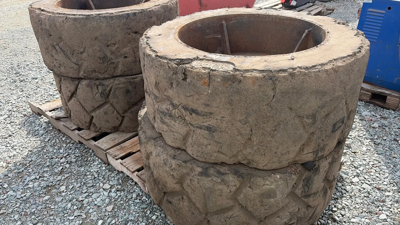 (4) Solid Rubber Tires On Rims