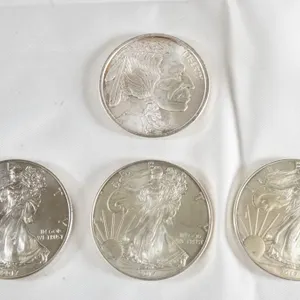 Lot of (4) Silver Coins