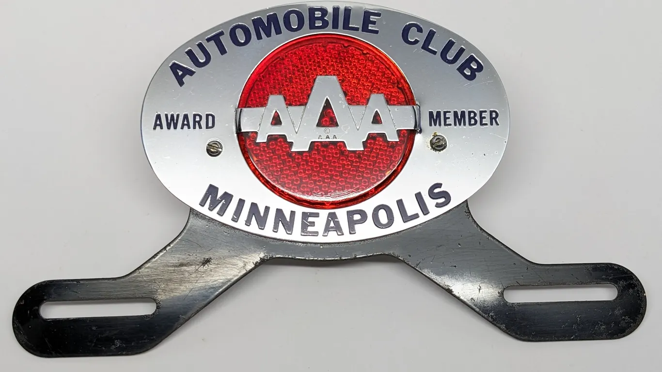 BRASS & GLASS LICENSE PLATE TOPPER SIGN TRIPLE A AAA AWARD MEMBER AUTOMOBILE CLUB MINNEAPOLIS (MINNESOTA)