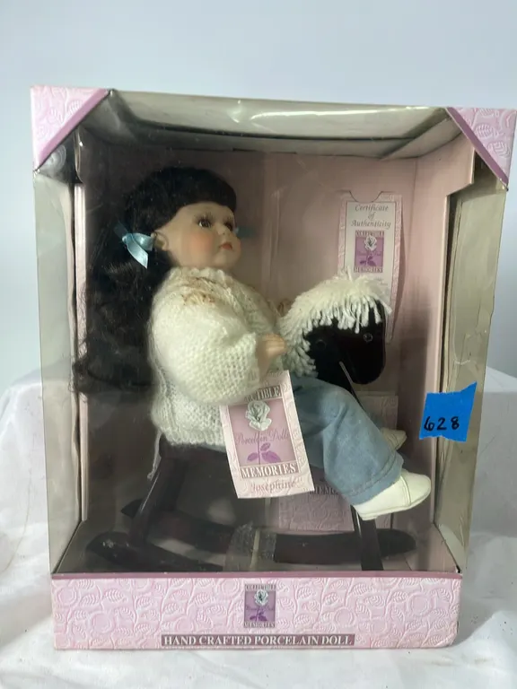 COLLECTIBLE JOSEPHINE PORCELAIN DOLL