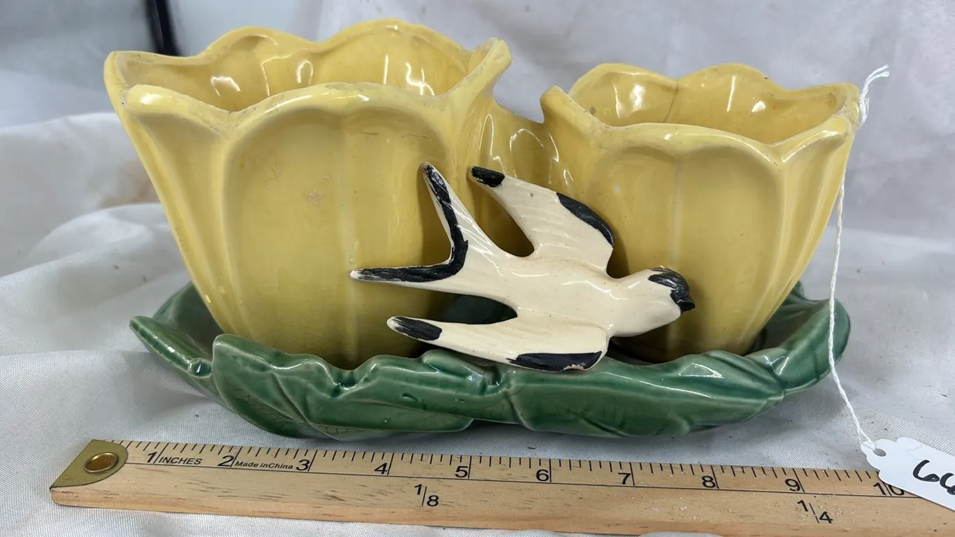 MCCOY YELLOWAND GREEN DOUBLE PLANTER WITH BIRD(SOME CHIPS AND CRACKS)