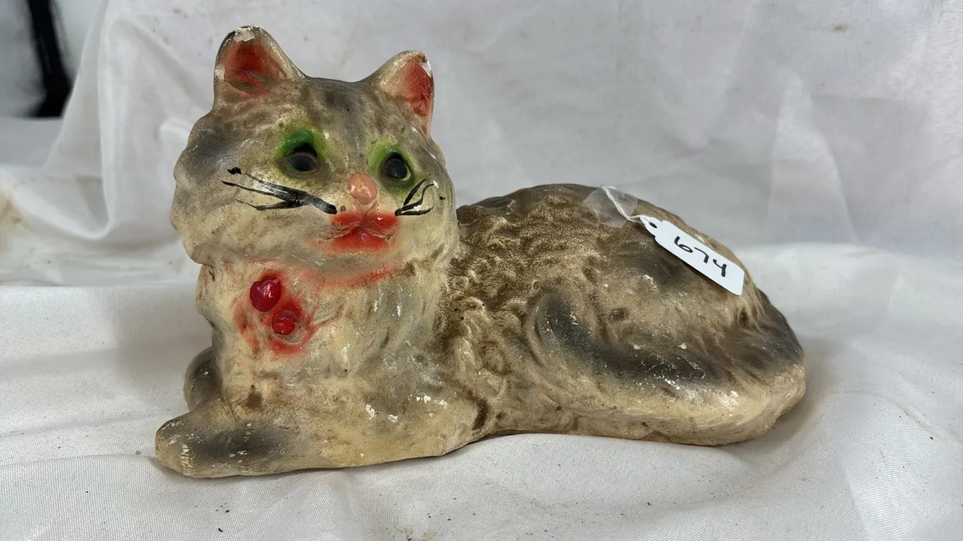 CHALKWARE CAT WITH CHIPS