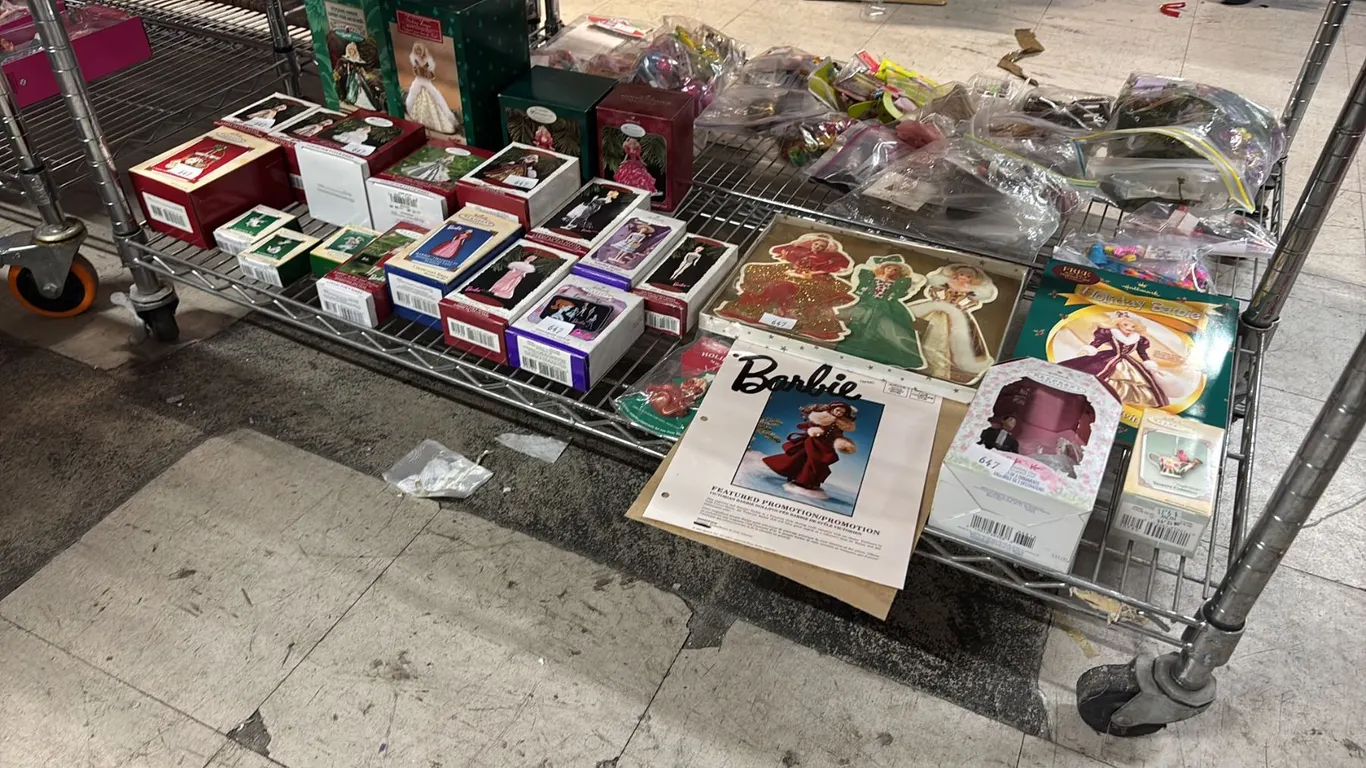 SHELF OF ASSORTED HALLMARK KEEPSAKES BARBIE ORNAMENTS, BARBIE HOLIDAY GREETING CARDS & MORE