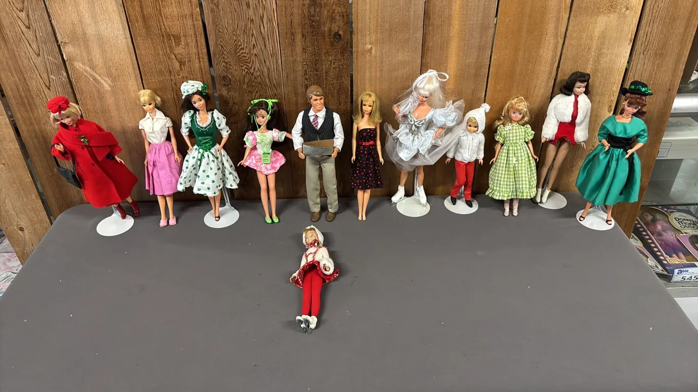 BOX OF ASSORTED VINTAGE BARBIES *NOT IN BOXES*