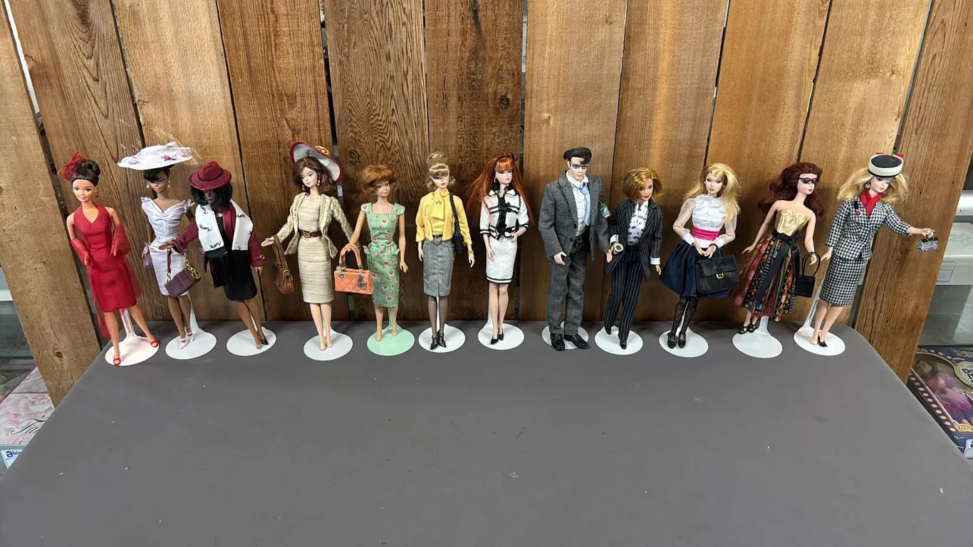 BOX OF ASSORTED VINTAGE BARBIES *NOT IN BOXES*
