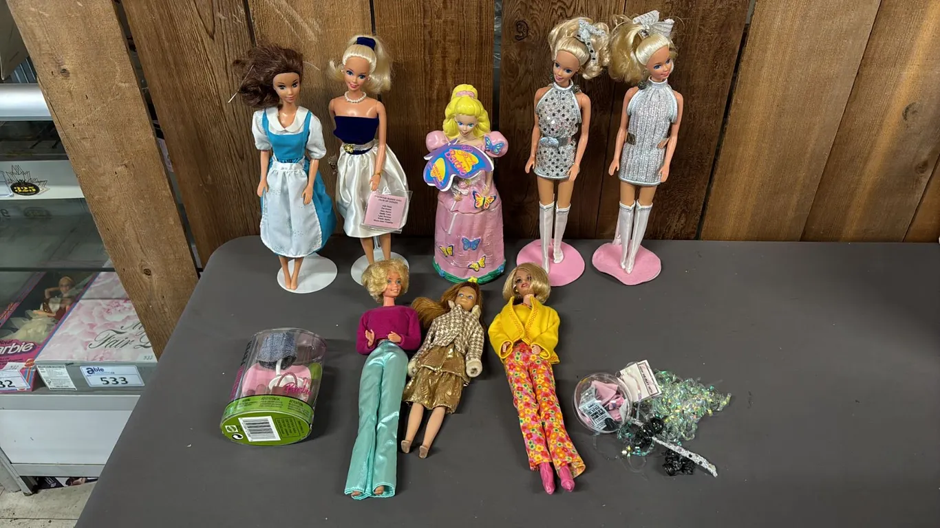 BOX OF ASSORTED VINTAGE BARBIES *NOT IN BOXES*