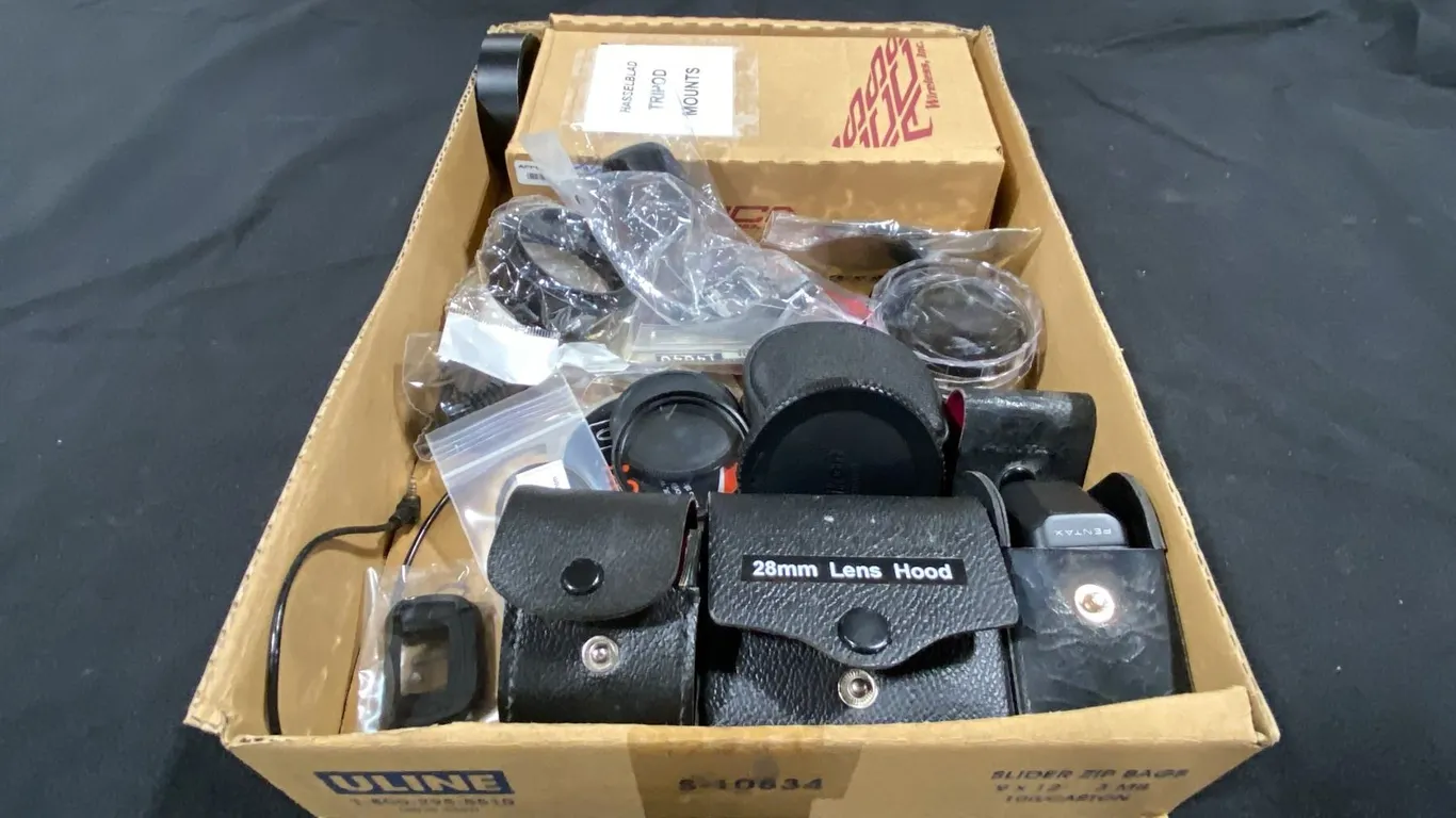 ASSORTED PENTAX LENS HOODS, FILTERS, PARTS & HASSELBLAD TRIPOD MOUNTS