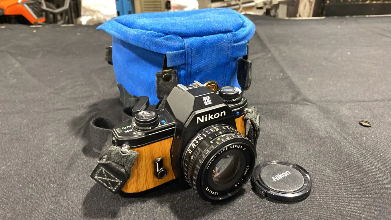 NIKON EM 35MM FILM SLR CAMERA WITH CUSTOM WOOD VENEERED FINISH, NIKON SERIES E F/1.8 LENS & BAG