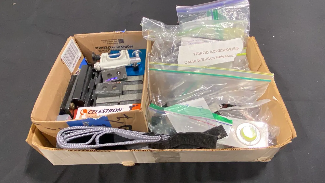 BOX OF ASSORTED TRIPOD ACCESSORIES, CABLE & BUTTON RELEASES