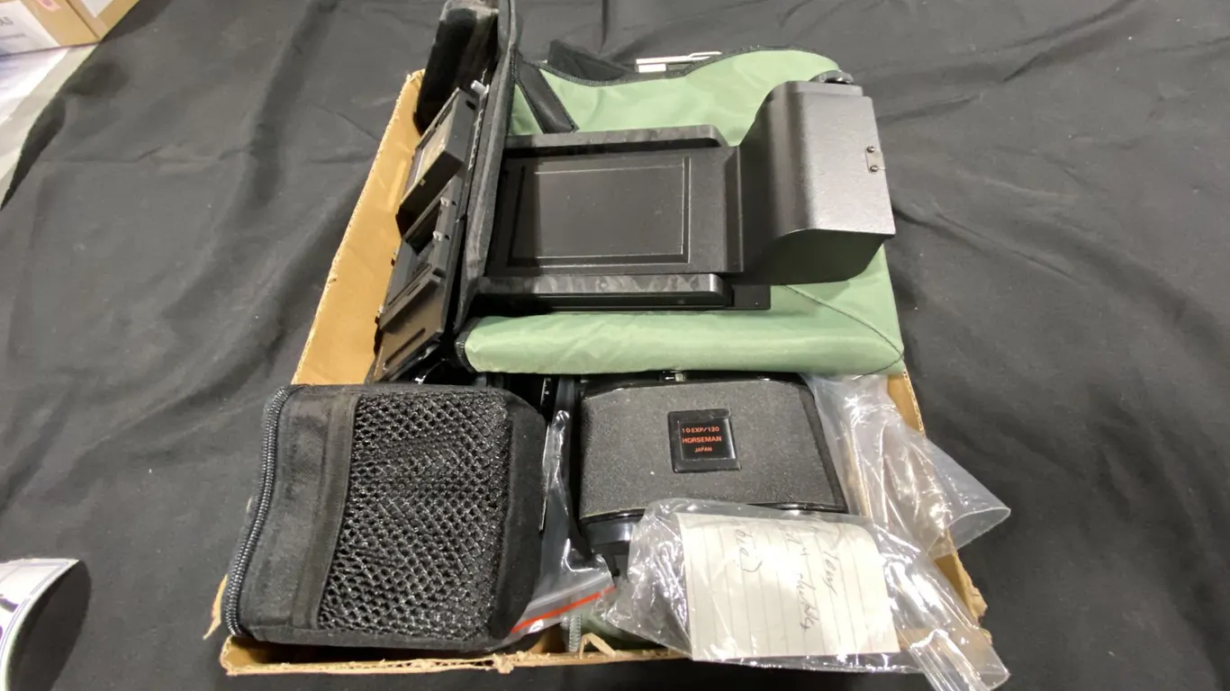 BOX OF POLAROID FILM HOLDERS & PARTS