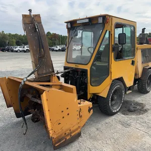 Trackless MT5T Sidewalk Machine with Dual Auger Blower