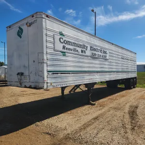 American Trailers Inc. 40' Semi Van Trailer w/roll up door, side door, steps, & shelving **CONTENTS DO NOT GO WITH**NO TITLE STORAGE TRAILER ONLY**