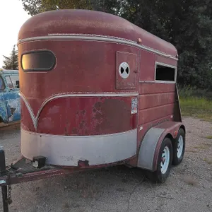 1992 CM 2 Horse Trailer w/divider, and tack area (Lights & Brakes not tested)