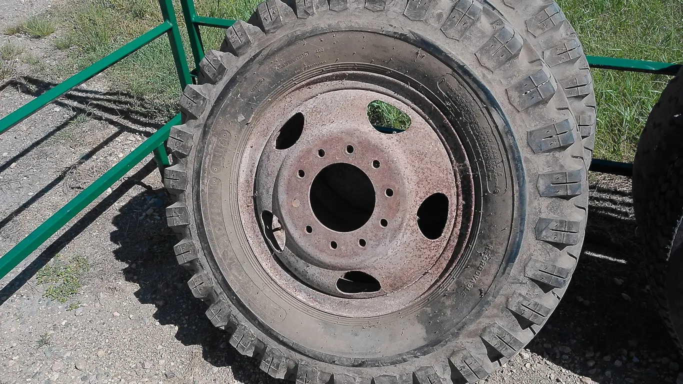 9:00x20 Truck Tires on 10 Bolt Wheels (Pair)