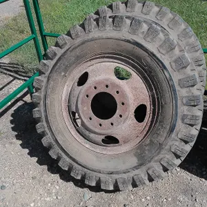 9:00x20 Truck Tires on 10 Bolt Wheels (Pair)