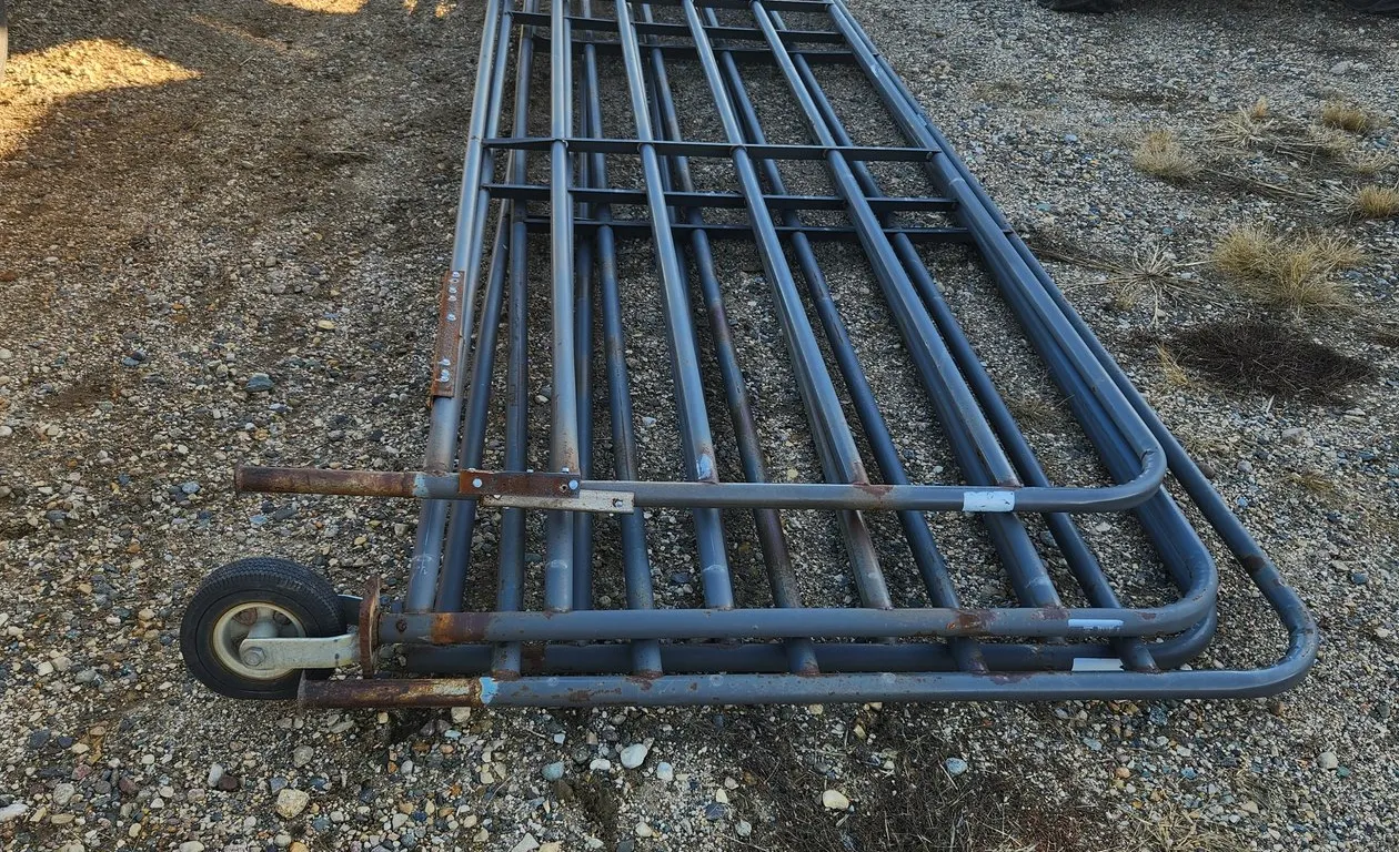 4-16' Cattle gates, 2 whith wheelssome repair