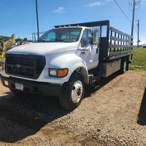 1999 Ford F650 Diesel Truck with stake side flatbed, toolboxes, & liftgate (New Batteries)