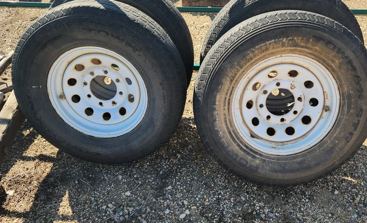 Set of 4 8 bolt trailer wheels with tires
