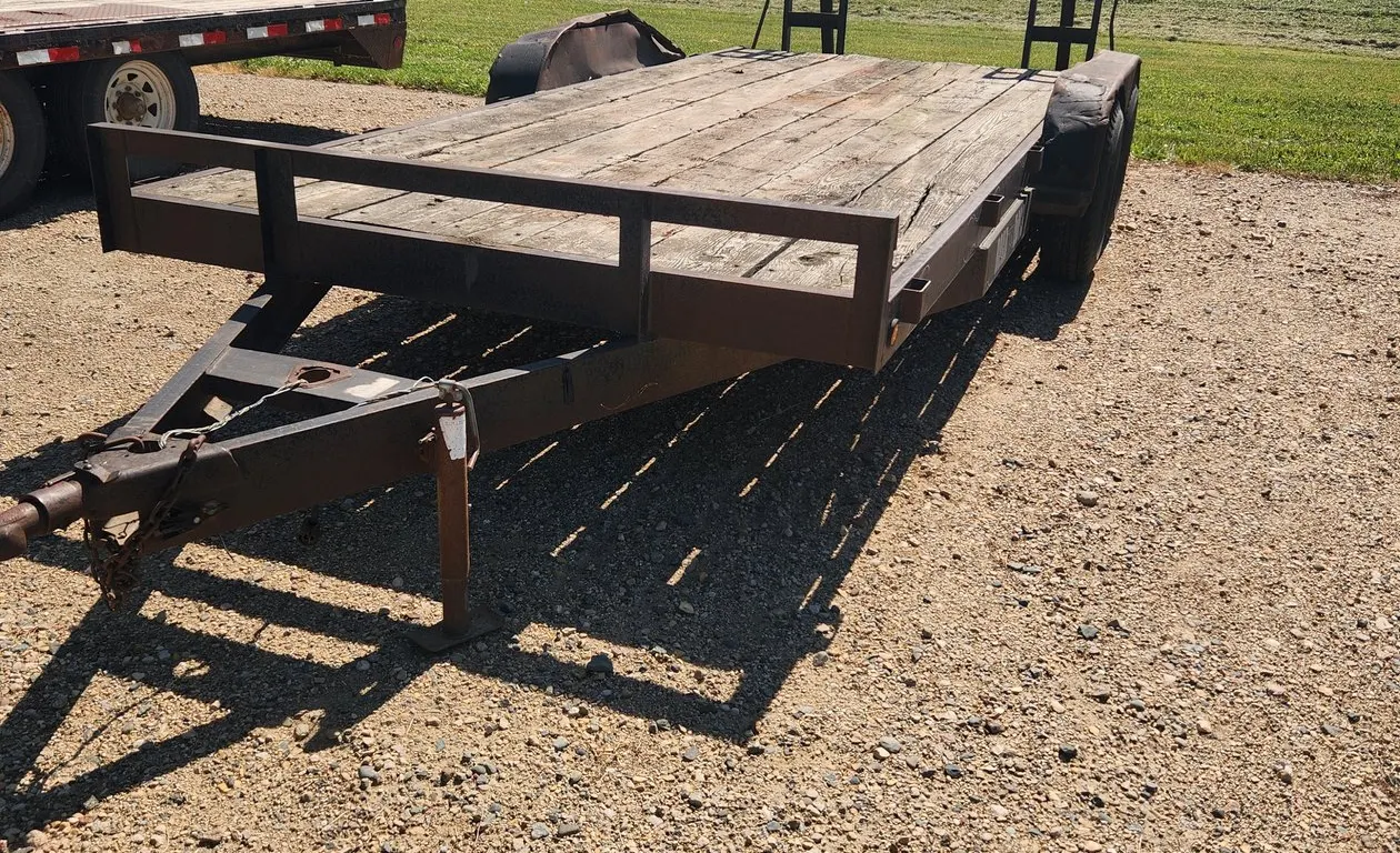 18' Equipment Trailer w/2-5200 lb. axles. **NO TITLE** will be sold with a bill of sale. **Lights & Brakes NOT working**