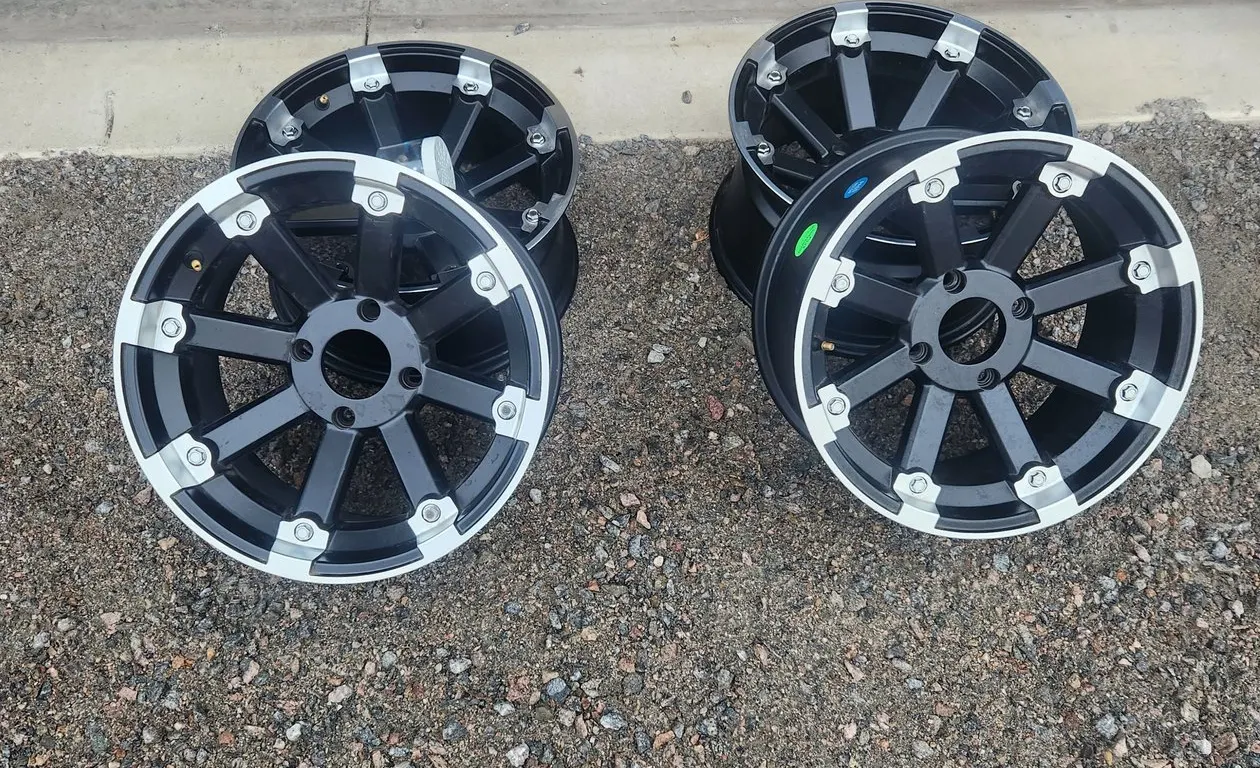 Aluminum Side x Side wheels less then 5 miles on them 2-15"x7" & 2-15"x8" **15" 4/115 Bolt Pattern off Arctic Cat Prowler 700 w/lugnuts