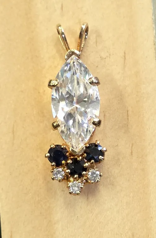 Gold Tone Marquise Clear Stone Pendant with Blue and Clear Accents