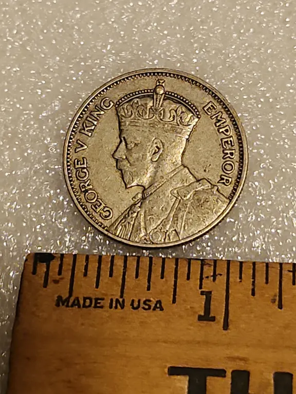 1934 King George V/Crouched Maori Warrior New Zealand One Shilling Silver/Copper Coin
