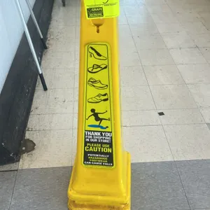 Sir Clean caution wet floor safety cones. Features yellow molded plastic 4-sided pyramid design, stackable construction, top opening, bilingual Englis