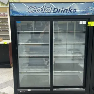Turbo Air TGM-48RB 2-door reach-in display refrigerator. Features 2 sliding glass doors, illuminated upper display canopy, multi-tier adjustable wire 