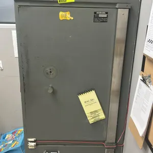 Allied-Gary commercial 2-compartment dual-door drop safe. Features upper compartment with interior shelf, two inner locker compartments, and door-moun
