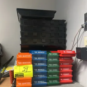 Assortment of coin trays and cash drawer till inserts. Includes stackable color-coded plastic coin counting and sorting trays for pennies, nickels, di