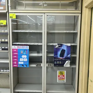 Metal 2-door multi-tier tobacco merchandiser. Features dual glass doors with latches, 5 adjustable metal shelves, base deck, price tag channels, and a