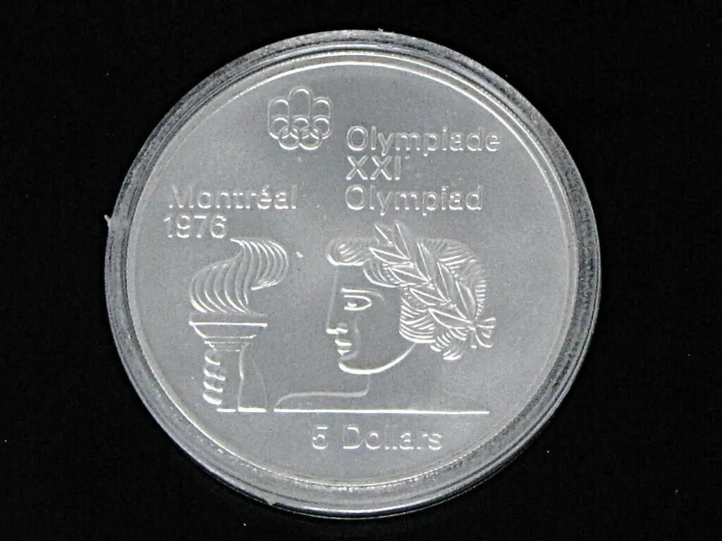 1976 MONTREAL OLYMPICS ATHLETE $5 .925 SILVER COIN