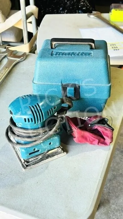Makita Electric palm sander in case
