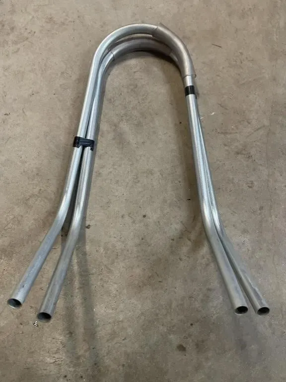 Pair of ladder stand-off stabilizers.