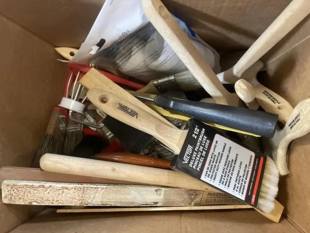 Box of paint brushes, rollers, stir sticks and