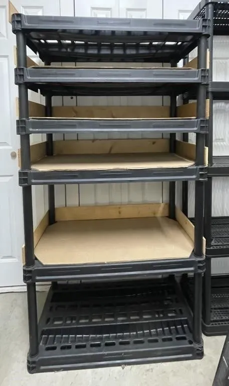 Multi-tiered plastic shelf unit. Approx. 35� x