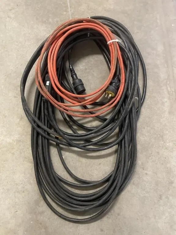 Four extension cords. Various lengths and gauges.