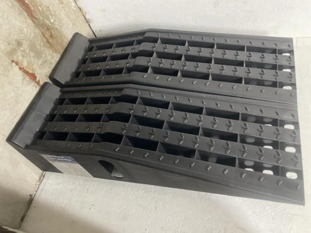 Pair of Power Fist 13,000 lb. Plastic vehicle