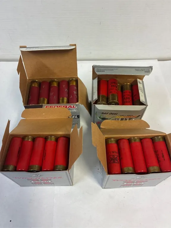 About 98. 12ga shotgun shells. Assorted