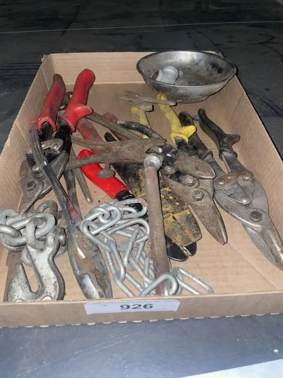 Tin snips, pliers, magnetic bowl, chain pieces