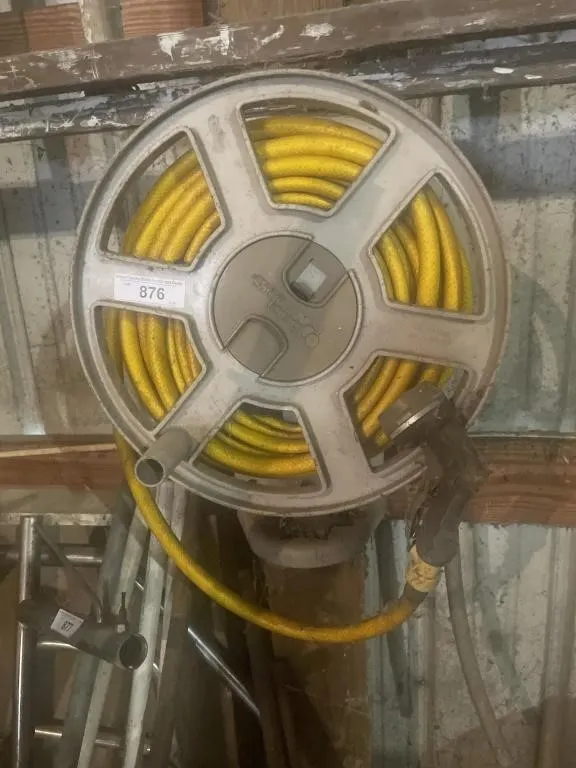 Water hose reel with hose and nozzle