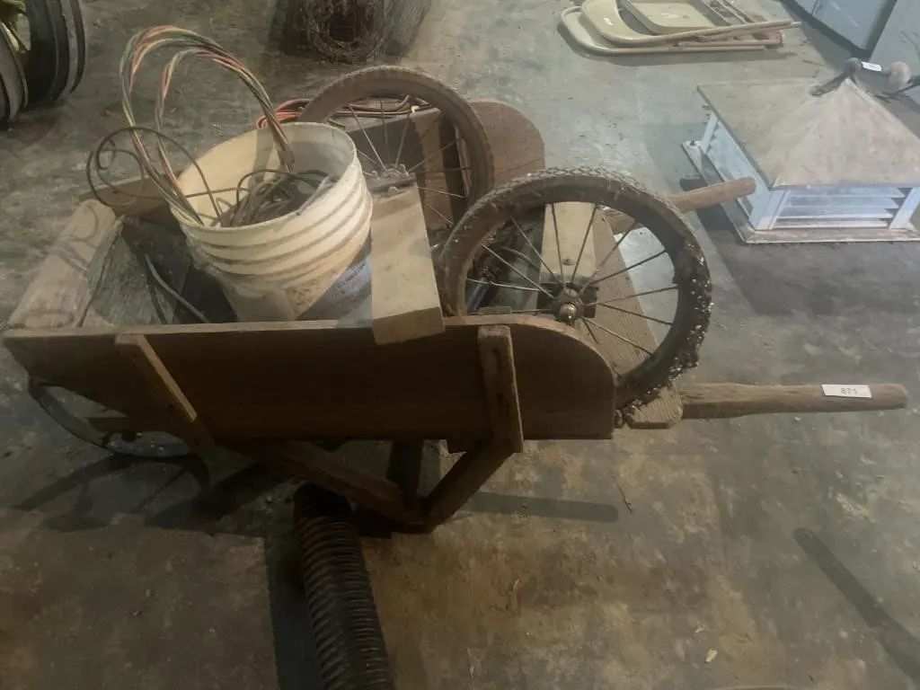 Wooden wheelbarrow with contents