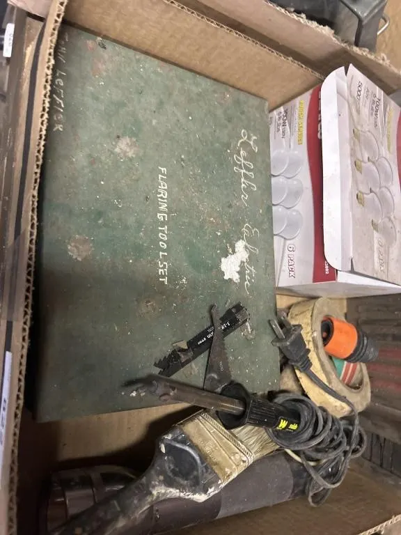 Soldering, iron, paintbrush, flashlights for